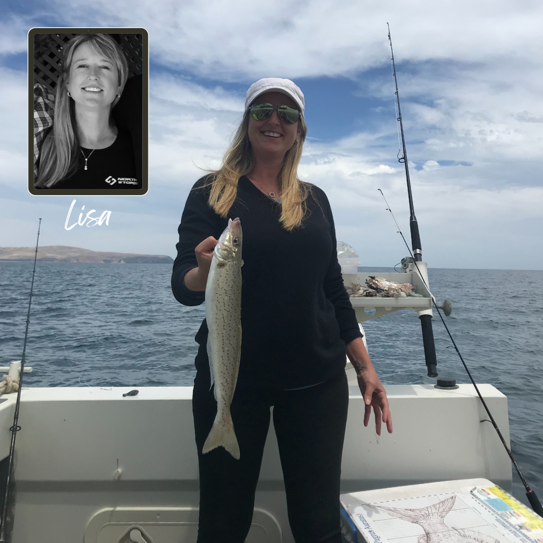 NORTH STORM WATERPROOF BAG FOUNDER LISA MCCABE HOLDING A FISH